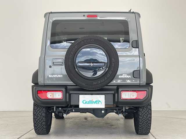 スズキ ジムニー シエラ JC 愛知県 2023(令5)年 1.7万km ミディアムグレー 9型ナビ/クルーズコントロール/シートヒーター/バックカメラ/純正アルミホイール/LEDヘッドライト/オートマチックハイビーム/ダウンヒルアシストコントロール/ドライブレコーダー/ETC/衝突軽減システム/フルセグ/CD DVD/Bluetooth/ステアリングスイッチ/スマートキー/プッシュスタート