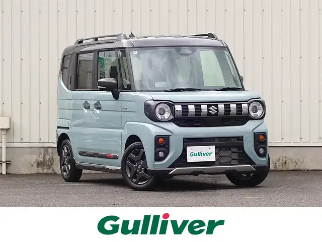 スズキ スペーシア ギア HYBRID XZ 山形県 2024(令6)年 0.1千km オフブルーメタリック/ガンメタリック2トーンルーフ 4WD/デュアルセンサーブレーキサポートII/両側パワースライドドア/レーダークルーズコントロール/LEDオートライト/シートヒーター/純正14インチアルミホイール/アイドリングストップ/コーナーセンサー/ステアリングスイッチ/ステアリングヒーター/ヘッドアップディスプレイ/電動格納ウィンカーミラー/フォグランプ/ルーフレール/スマートキー