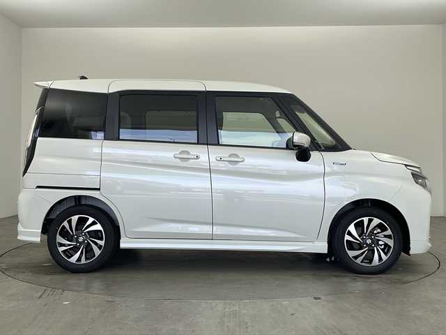 スズキ ソリオ バンディット HV MV 兵庫県 2025(令7)年 0.1万km未満 ピュアホワイトP ・純正ナビ/　Bluetoothオーディオ/　CD/DVD再生/　USB接続/　ipod接続/　フルセグテレビ/・アラウンドビューモニター/・フルフラットシート/・ウォークスルー/・シートヒーター（運転席・助手席）/・純正15インチアルミホイール/・両側パワースライドドア/・レーダークルーズコントロール/・レーンキープアシスト/・衝突被害軽減システム/・ABS/・横滑り防止機能/・前後コーナーセンサー/・盗難防止装置/・オートライト/・LEDヘッドライト/・フォグランプ/・W＋サイドエアバック/・カーテンエアバック/・プッシュスタート/・パーキングアシスト/・アイドリングストップ/・AACエアコン