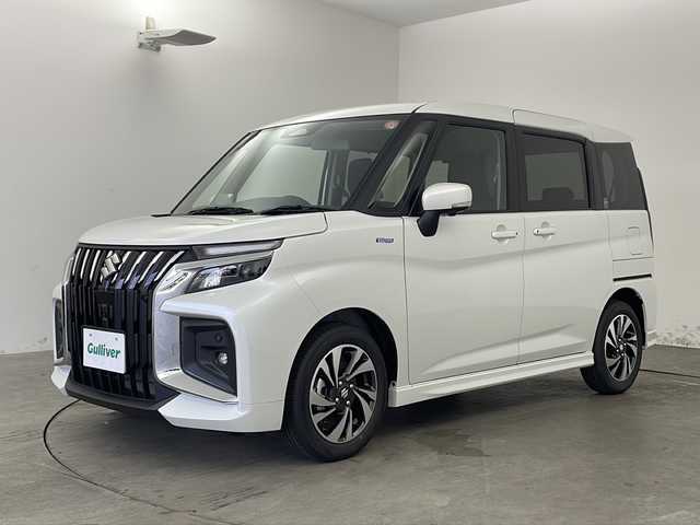スズキ ソリオ バンディット HV MV 兵庫県 2025(令7)年 0.1万km未満 ピュアホワイトP ・純正ナビ/　Bluetoothオーディオ/　CD/DVD再生/　USB接続/　ipod接続/　フルセグテレビ/・アラウンドビューモニター/・フルフラットシート/・ウォークスルー/・シートヒーター（運転席・助手席）/・純正15インチアルミホイール/・両側パワースライドドア/・レーダークルーズコントロール/・レーンキープアシスト/・衝突被害軽減システム/・ABS/・横滑り防止機能/・前後コーナーセンサー/・盗難防止装置/・オートライト/・LEDヘッドライト/・フォグランプ/・W＋サイドエアバック/・カーテンエアバック/・プッシュスタート/・パーキングアシスト/・アイドリングストップ/・AACエアコン