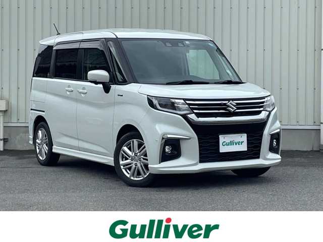 スズキ ソリオ HV MZ 山形県 2022(令4)年 4.4万km ピュアホワイトP 4WD/衝突軽減ブレーキ/両側パワースライドドア/全方位カメラ/純正10インチナビ/　【CD DVD SD USB BT】/フルセグTV/ETC/ステアリングスイッチ/レーダークルーズコントロール/アイドリングストップ/横滑り防止装置/シートヒーター/ミラーヒーター/純正アルミ/LEDライト/フォグランプ/ウィンカーミラー/純正フロアマット/ドアバイザー