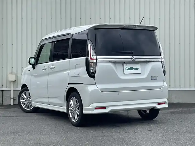 スズキ ソリオ HV MZ 山形県 2022(令4)年 4.4万km ピュアホワイトP 4WD/衝突軽減ブレーキ/両側パワースライドドア/全方位カメラ/純正10インチナビ/　【CD DVD SD USB BT】/フルセグTV/ETC/ステアリングスイッチ/レーダークルーズコントロール/アイドリングストップ/横滑り防止装置/シートヒーター/ミラーヒーター/純正アルミ/LEDライト/フォグランプ/ウィンカーミラー/純正フロアマット/ドアバイザー