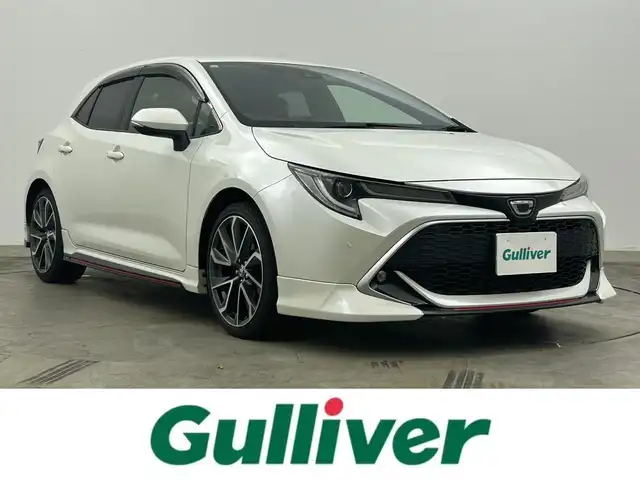トヨタ カローラ スポーツ G Z 岡山県 2019(平31)年 5.2万km ホワイトパールクリスタルシャイン ＴＲＤエアロ/純正9インチＳＤナビゲーション/(CD/DVD/SD/BT/HDMI/フルセグTV)/バックモニター/ビルトインETC/純正ドライブレコーダー前方/前席シートヒーター/衝突軽減ブレーキ/レーダークルーズコントロール/レーンキープアシスト/オートハイビームアシスト/LEDオートヘッドライト/純正18インチAW/スマートキー