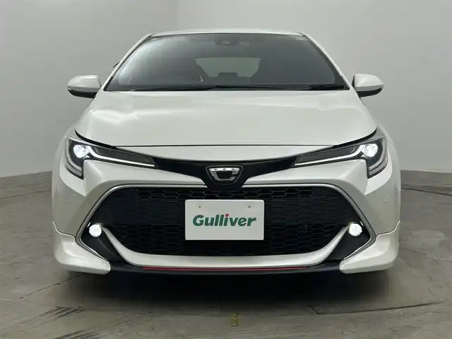 トヨタ カローラ スポーツ G Z 岡山県 2019(平31)年 5.2万km ホワイトパールクリスタルシャイン ＴＲＤエアロ/純正9インチＳＤナビゲーション/(CD/DVD/SD/BT/HDMI/フルセグTV)/バックモニター/ビルトインETC/純正ドライブレコーダー前方/前席シートヒーター/衝突軽減ブレーキ/レーダークルーズコントロール/レーンキープアシスト/オートハイビームアシスト/LEDオートヘッドライト/純正18インチAW/スマートキー