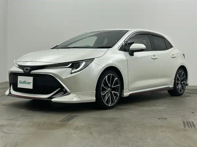 トヨタ カローラ スポーツ G Z 岡山県 2019(平31)年 5.2万km ホワイトパールクリスタルシャイン ＴＲＤエアロ/純正9インチＳＤナビゲーション/(CD/DVD/SD/BT/HDMI/フルセグTV)/バックモニター/ビルトインETC/純正ドライブレコーダー前方/前席シートヒーター/衝突軽減ブレーキ/レーダークルーズコントロール/レーンキープアシスト/オートハイビームアシスト/LEDオートヘッドライト/純正18インチAW/スマートキー