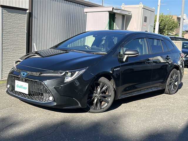 トヨタ カローラツーリング ハイブリッド ダブルバイビー 道東・釧路十勝 2019(令1)年 6.9万km ブラックマイカ ４WD/純正モニターオーディオ/Bluetooth/Miracast/バックカメラ /レーダークルーズコントロール/ステアリングヒーター/デアイサー/革巻ステアリング/ミラーヒーター/前席シートヒーター