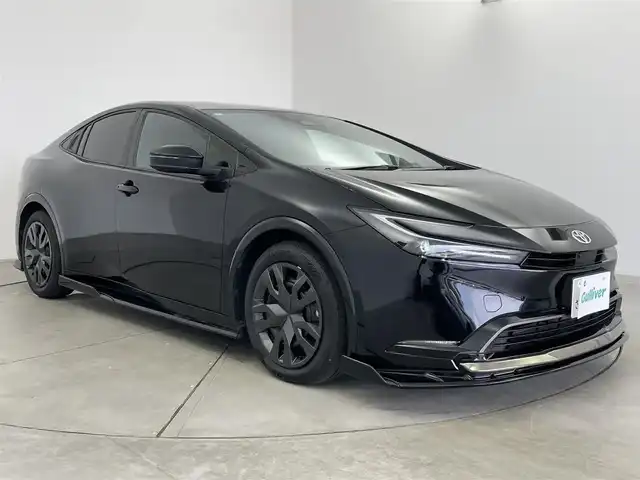 トヨタ プリウス Z 愛知県 2024(令6)年 1.5万km アティチュードブラックマイカ フルエアロ/純正12.3インチディスプレイオーディオナビ/フルセグTV/FM/AM/Miracast/パノラミックビューモニター/置くだけ充電/プリクラッシュセーフティ/レーダークルーズコントロール/レーンディパーチャーアラート/オートマチックハイビーム/ブラインドスポットモニター/トヨタチームメイト/LEDヘッドライト/オートライト/デジタルインナーミラー/合皮シート/パワーシート/シートヒーター/シートベンチレーション/シートメモリー/合皮巻きステアリングホイール/ステアリングヒーター/ステアリングスイッチ/電子パーキング/パワーバックドア/ビルトインETC2.0/コーナーセンサー/プッシュスタート/スマートキー/電動格納ミラー/ウインカーミラー/フロアマット