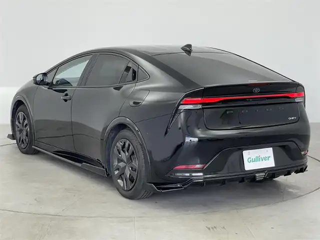 トヨタ プリウス Z 愛知県 2024(令6)年 1.5万km アティチュードブラックマイカ フルエアロ/純正12.3インチディスプレイオーディオナビ/フルセグTV/FM/AM/Miracast/パノラミックビューモニター/置くだけ充電/プリクラッシュセーフティ/レーダークルーズコントロール/レーンディパーチャーアラート/オートマチックハイビーム/ブラインドスポットモニター/トヨタチームメイト/LEDヘッドライト/オートライト/デジタルインナーミラー/合皮シート/パワーシート/シートヒーター/シートベンチレーション/シートメモリー/合皮巻きステアリングホイール/ステアリングヒーター/ステアリングスイッチ/電子パーキング/パワーバックドア/ビルトインETC2.0/コーナーセンサー/プッシュスタート/スマートキー/電動格納ミラー/ウインカーミラー/フロアマット