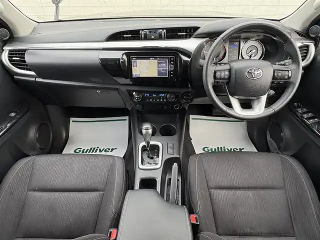 トヨタ ハイラックス Z 岩手県 2022(令4)年 2.1万km アティチュードブラックマイカ 禁煙車/4WD（切替）/ディーゼル/純正ナビ/→フルセグTV/Bluetooth/CD/DVD/FM/AM/バックカメラ/ステアリングスイッチ/横滑り防止装置/ダウンヒルアシストコントロール/コーナーセンサー/レーンキープアシスト/衝突軽減システム/オートライト/LDヘッドライト/フォグライト/〇プッシュスタート/〇電動格納ミラー/〇ウィンカーミラー/〇全席オートパワーウィンドウ/〇スマートキー/〇シガーソケット/〇ドアバイザー/〇取扱説明書/ETC/冬タイヤ社外アルミホイール車載