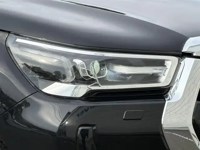 トヨタ ハイラックス Z 岩手県 2022(令4)年 2.1万km アティチュードブラックマイカ 禁煙車/4WD（切替）/ディーゼル/純正ナビ/→フルセグTV/Bluetooth/CD/DVD/FM/AM/バックカメラ/ステアリングスイッチ/横滑り防止装置/ダウンヒルアシストコントロール/コーナーセンサー/レーンキープアシスト/衝突軽減システム/オートライト/LDヘッドライト/フォグライト/〇プッシュスタート/〇電動格納ミラー/〇ウィンカーミラー/〇全席オートパワーウィンドウ/〇スマートキー/〇シガーソケット/〇ドアバイザー/〇取扱説明書/ETC/冬タイヤ社外アルミホイール車載