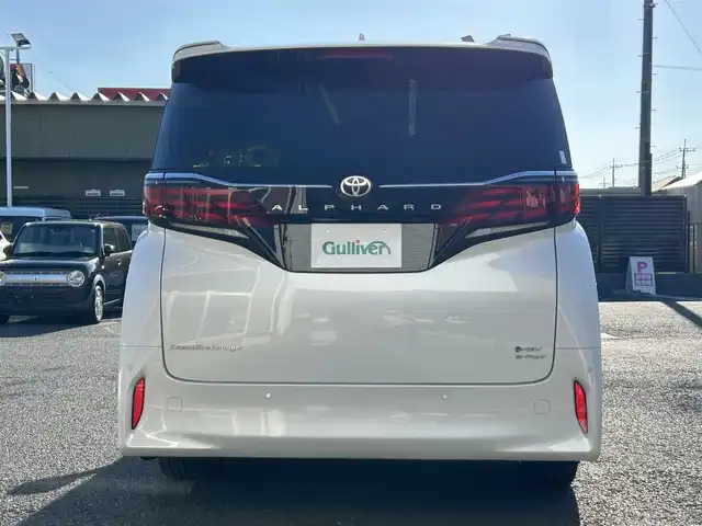 トヨタ アルファードハイブリット エグゼクティブ ラウンジ 埼玉県 2024(令6)年 1.8万km プラチナホワイトパールマイカ 純正ナビ（Bluetooth、CD、DVD、フルセグTV）/全方位カメラ/ETC2.0/サンルーフ/フリップダウン/電動リアゲート/前後ドラレコ/JBLサウンド/ワイヤレス充電/リラクゼーション機能/ワンオーナー/パーキングアシスト/4WD/100V充電/追従走行有クルコン/スペアキー/USB入力端子/オットマン/純正フロアマット/二列目までパワーシート・エアシート・シートヒーター/レザーシート/純正アルミ/LEDヘッド/クリアランスソナー/カーテンエアバッグ/オートマチックハイビーム