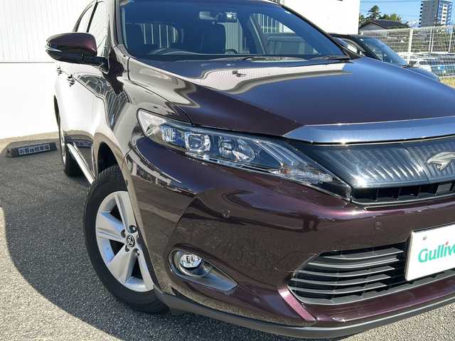 トヨタ ハリアー エレガンス 富山県 2017(平29)年 7万km ブラキッシュレッドマイカ ワンオーナー/スマートキー×２/ハーフレザーシート/ALPINE製9インチメモリーナビ(EX9V)/DVD/MSV/BT/フルセグTV/バックカメラ/9インチフリップダウンモニター(PXH9S-R)/ビルトインETC/ステアリングスイッチ/皮巻きステアリング/前後ドラレコ(ZDR-015)/パワーシート/クリアランスソナー/オートリトラミラー/レーダークルコン/純正17インチAW/横滑り防止装置/保証書・取説・ナビ取説