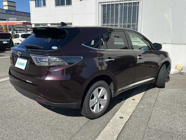 トヨタ ハリアー エレガンス 富山県 2017(平29)年 7万km ブラキッシュレッドマイカ ワンオーナー/スマートキー×２/ハーフレザーシート/ALPINE製9インチメモリーナビ(EX9V)/DVD/MSV/BT/フルセグTV/バックカメラ/9インチフリップダウンモニター(PXH9S-R)/ビルトインETC/ステアリングスイッチ/皮巻きステアリング/前後ドラレコ(ZDR-015)/パワーシート/クリアランスソナー/オートリトラミラー/レーダークルコン/純正17インチAW/横滑り防止装置/保証書・取説・ナビ取説