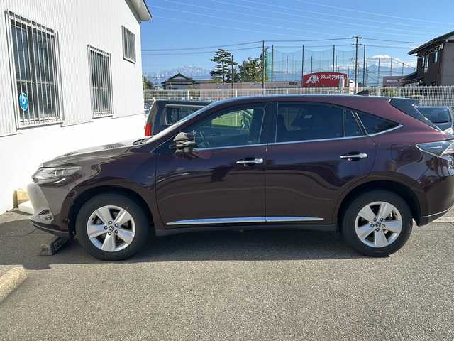 トヨタ ハリアー エレガンス 富山県 2017(平29)年 7万km ブラキッシュレッドマイカ ワンオーナー/スマートキー×２/ハーフレザーシート/ALPINE製9インチメモリーナビ(EX9V)/DVD/MSV/BT/フルセグTV/バックカメラ/9インチフリップダウンモニター(PXH9S-R)/ビルトインETC/ステアリングスイッチ/皮巻きステアリング/前後ドラレコ(ZDR-015)/パワーシート/クリアランスソナー/オートリトラミラー/レーダークルコン/純正17インチAW/横滑り防止装置/保証書・取説・ナビ取説