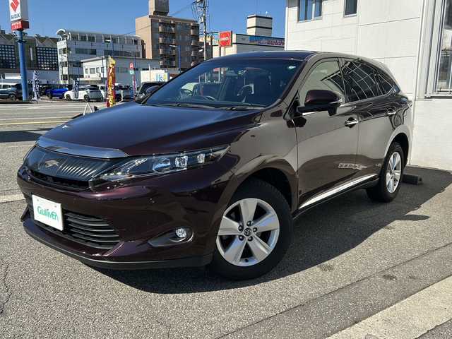 トヨタ ハリアー エレガンス 富山県 2017(平29)年 7万km ブラキッシュレッドマイカ ワンオーナー/スマートキー×２/ハーフレザーシート/ALPINE製9インチメモリーナビ(EX9V)/DVD/MSV/BT/フルセグTV/バックカメラ/9インチフリップダウンモニター(PXH9S-R)/ビルトインETC/ステアリングスイッチ/皮巻きステアリング/前後ドラレコ(ZDR-015)/パワーシート/クリアランスソナー/オートリトラミラー/レーダークルコン/純正17インチAW/横滑り防止装置/保証書・取説・ナビ取説