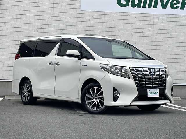 トヨタ アルファードハイブリット エグゼクティブ ラウンジ 山形県 2016(平28)年 6.4万km ラグジュアリーホワイトパールクリスタルシャインガラスフレーク 禁煙車/Toyota Safety Sense /・プリクラッシュセーフティ/・レーンディパーチャーアラート/・オートマチックハイビーム/・レーダークルーズコントロール/レザーシート/サンルーフ/JBLプレミアムサウンド/純正ナビ(CD.DVD.BT.USB.AUX)/パノラミックビューモニター/フルセグ/両側パワースライドドア/パワーバックドア/クリアランスソナー/シートヒーター/ステアリングヒーター/パワーシート/ETC/電動パーキングブレーキ/オートホールド/LEDヘッドライト/プッシュスタート/スマートキー