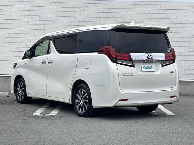 トヨタ アルファードハイブリット エグゼクティブ ラウンジ 山形県 2016(平28)年 6.4万km ラグジュアリーホワイトパールクリスタルシャインガラスフレーク 禁煙車/Toyota Safety Sense /・プリクラッシュセーフティ/・レーンディパーチャーアラート/・オートマチックハイビーム/・レーダークルーズコントロール/レザーシート/サンルーフ/JBLプレミアムサウンド/純正ナビ(CD.DVD.BT.USB.AUX)/パノラミックビューモニター/フルセグ/両側パワースライドドア/パワーバックドア/クリアランスソナー/シートヒーター/ステアリングヒーター/パワーシート/ETC/電動パーキングブレーキ/オートホールド/LEDヘッドライト/プッシュスタート/スマートキー