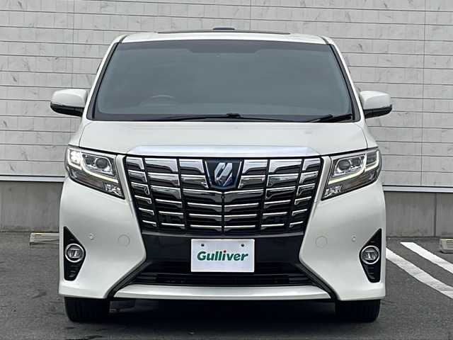 トヨタ アルファードハイブリット エグゼクティブ ラウンジ 山形県 2016(平28)年 6.4万km ラグジュアリーホワイトパールクリスタルシャインガラスフレーク 禁煙車/Toyota Safety Sense /・プリクラッシュセーフティ/・レーンディパーチャーアラート/・オートマチックハイビーム/・レーダークルーズコントロール/レザーシート/サンルーフ/JBLプレミアムサウンド/純正ナビ(CD.DVD.BT.USB.AUX)/パノラミックビューモニター/フルセグ/両側パワースライドドア/パワーバックドア/クリアランスソナー/シートヒーター/ステアリングヒーター/パワーシート/ETC/電動パーキングブレーキ/オートホールド/LEDヘッドライト/プッシュスタート/スマートキー