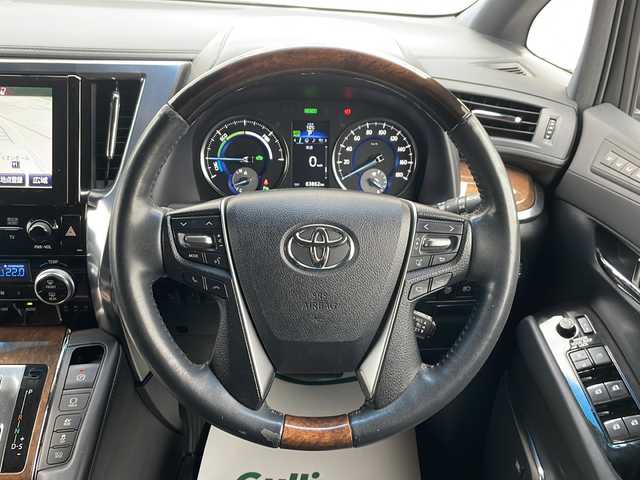 トヨタ アルファードハイブリット エグゼクティブ ラウンジ 山形県 2016(平28)年 6.4万km ラグジュアリーホワイトパールクリスタルシャインガラスフレーク 禁煙車/Toyota Safety Sense /・プリクラッシュセーフティ/・レーンディパーチャーアラート/・オートマチックハイビーム/・レーダークルーズコントロール/レザーシート/サンルーフ/JBLプレミアムサウンド/純正ナビ(CD.DVD.BT.USB.AUX)/パノラミックビューモニター/フルセグ/両側パワースライドドア/パワーバックドア/クリアランスソナー/シートヒーター/ステアリングヒーター/パワーシート/ETC/電動パーキングブレーキ/オートホールド/LEDヘッドライト/プッシュスタート/スマートキー