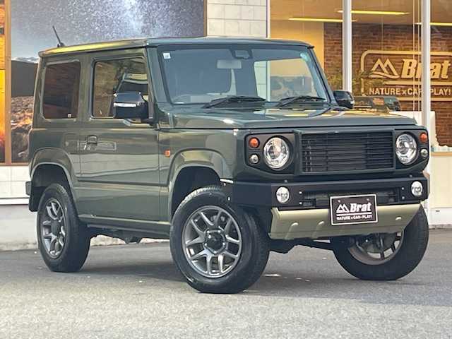 スズキ ジムニー XC 愛知県 2021(令3)年 0.8万km ジャングルグリーン ダムドlittleDグリル/ダムドlittleDフロントバンパー/ダムドlittleDリアバンパー/衝突軽減ブレーキ/クルーズコントロール/社外ナビ・フルセグTV/純正16インチアルミホイール/バックカメラ/シートヒーター/プッシュスタート/スマートキー