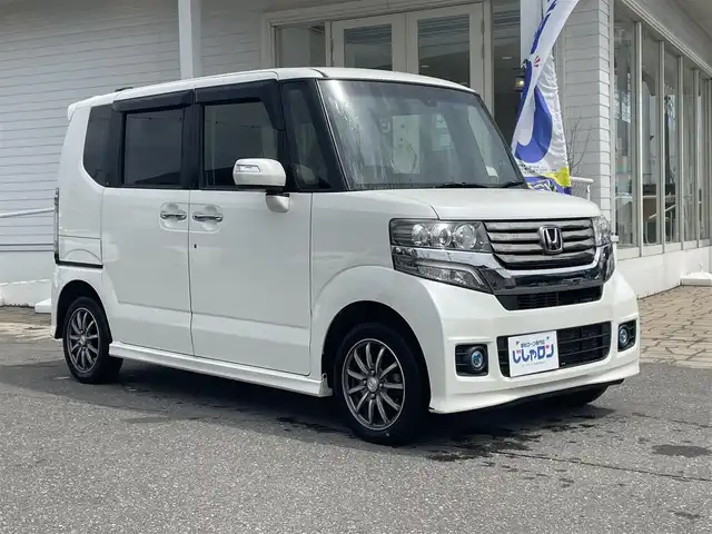 ホンダ Ｎ ＢＯＸ G ターボ SSパッケージ 秋田県 2014(平26)年 6.4万km プレミアムホワイトパール (株)IDOMが運営する【じしゃロン 秋田店】の自社ローン専用車両になります。こちらは現金またはオートローンご利用時の価格です。自社ローンご希望の方は別途その旨お申付け下さい/メモリナビ/フルセグテレビ/バックカメラ/ウィンカーミラー/プッシュスタート/両側パワースライドドア