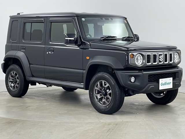 スズキ ジムニー ノマド FC 道央・札幌 2025(令7)年 0.1万km 黒 ・4WD/・ワンオーナー/・寒冷地仕様/・スズキセーフティサポート/・デュアルブレーキサポート/・誤発進抑制機能/・ふらつき警報機能/・標識認識機能/・先行車発進お知らせ機能/・レーダークルーズコントロール/・センターデフロック/・シートヒーター/・ダウンヒルアシストコントロール/・オートマチックハイビーム/・オートライト/・ヘッドライトウォッシャー/・LEDヘッドライト/・フォグランプ/・D/Nシートヒーター/・ヘッドライトレベライザー/・スマートキー/・アイドリングストップ/・ドアミラーヒーター/・横滑り防止/・純正１５インチAW