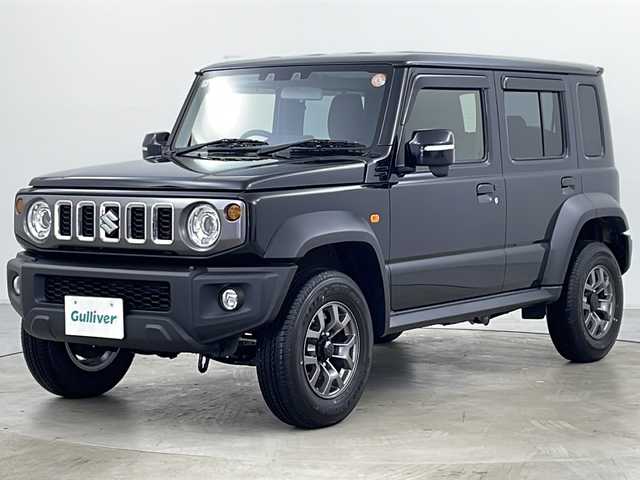 スズキ ジムニー ノマド FC 道央・札幌 2025(令7)年 0.1万km 黒 ・4WD/・ワンオーナー/・寒冷地仕様/・スズキセーフティサポート/・デュアルブレーキサポート/・誤発進抑制機能/・ふらつき警報機能/・標識認識機能/・先行車発進お知らせ機能/・レーダークルーズコントロール/・センターデフロック/・シートヒーター/・ダウンヒルアシストコントロール/・オートマチックハイビーム/・オートライト/・ヘッドライトウォッシャー/・LEDヘッドライト/・フォグランプ/・D/Nシートヒーター/・ヘッドライトレベライザー/・スマートキー/・アイドリングストップ/・ドアミラーヒーター/・横滑り防止/・純正１５インチAW