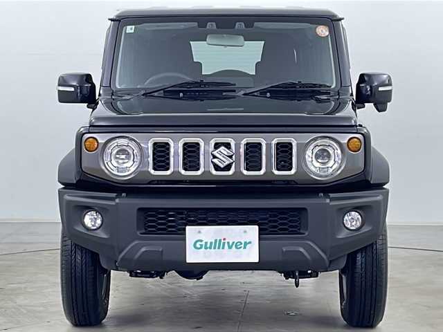 スズキ ジムニー ノマド FC 道央・札幌 2025(令7)年 0.1万km 黒 ・4WD/・ワンオーナー/・寒冷地仕様/・スズキセーフティサポート/・デュアルブレーキサポート/・誤発進抑制機能/・ふらつき警報機能/・標識認識機能/・先行車発進お知らせ機能/・レーダークルーズコントロール/・センターデフロック/・シートヒーター/・ダウンヒルアシストコントロール/・オートマチックハイビーム/・オートライト/・ヘッドライトウォッシャー/・LEDヘッドライト/・フォグランプ/・D/Nシートヒーター/・ヘッドライトレベライザー/・スマートキー/・アイドリングストップ/・ドアミラーヒーター/・横滑り防止/・純正１５インチAW