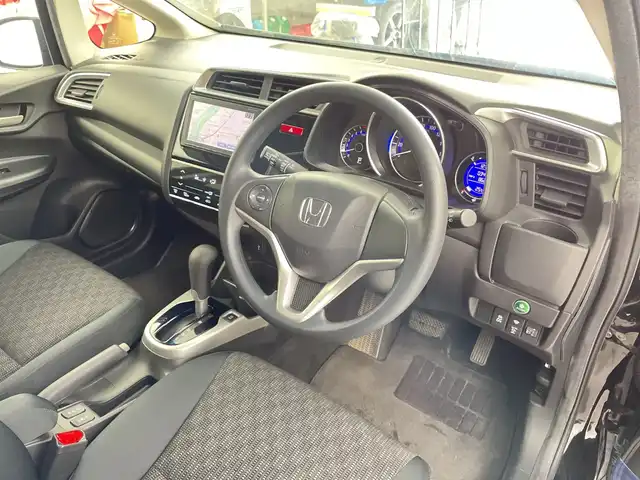 ホンダ フィット 13G FパックコンフォートED 道央・札幌 2016(平28)年 3.4万km クリスタルブラックパール 衝突軽減ブレーキ　純正ナビ　ＴＶ　Ｂｌｕｅｔｏｏｔｈ　バックＣ　ワイパーデアイサー　ＥＴＣ　シートヒーター　１５ＡＷ　コーナーセンサー　ヒーター付電格ミラー　スマートキー　純正マット　ＡＡＣ