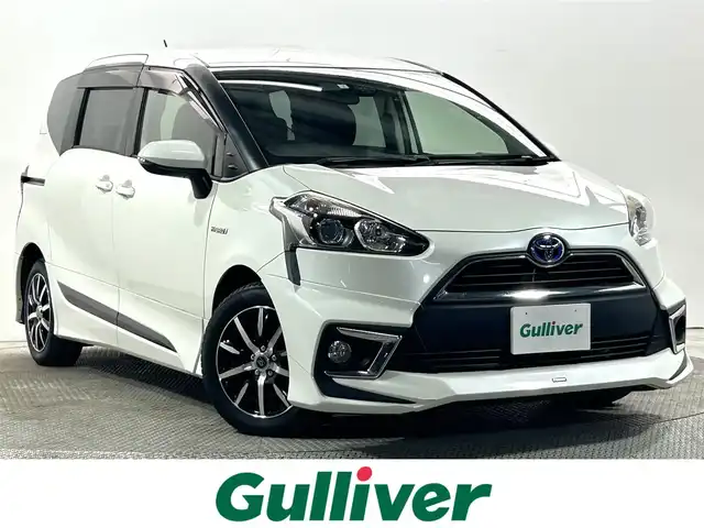 トヨタ シエンタ ハイブリッド G 大阪府 2016(平28)年 5.7万km ホワイトパールクリスタルシャイン モデリスタエアロ 純正ナビ(地デジ/CD再生/Bluetooth) バックカメラ ETC 両側パワースライドドア 衝突軽減 トヨタセーフティセンス スマートキー Pスタート 100V電源