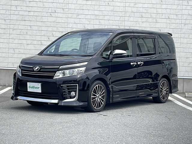 トヨタ ヴォクシー ZS 煌 山形県 2015(平27)年 7.5万km 黒 禁煙車/社外８インチナビ　/ALPINEフリップダウンモニター　/両側パワースライドドア　/バックカメラ　/アイドリングストップ　/ＥＴＣ　/社外17インチAW　/横滑り防止　/オートライト　/スマートキー　/プッシュスタート　
