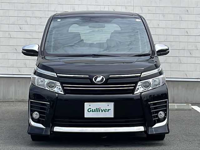 トヨタ ヴォクシー ZS 煌 山形県 2015(平27)年 7.5万km 黒 禁煙車/社外８インチナビ　/ALPINEフリップダウンモニター　/両側パワースライドドア　/バックカメラ　/アイドリングストップ　/ＥＴＣ　/社外17インチAW　/横滑り防止　/オートライト　/スマートキー　/プッシュスタート　
