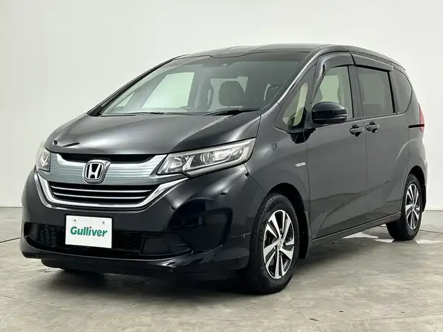 ホンダ フリード ハイブリット EX 三重県 2016(平28)年 5.7万km クリスタルブラックパール 禁煙車/純正ナビ（VXM-174VFi）/・フルセグ・CD・DVD・Bluetooth・SD・iPod/バックカメラ/両側パワースライドドア/前席シートヒーター/クルーズコントロール/ステアリングスイッチ/ビルトインETC/衝突軽減/車線逸脱