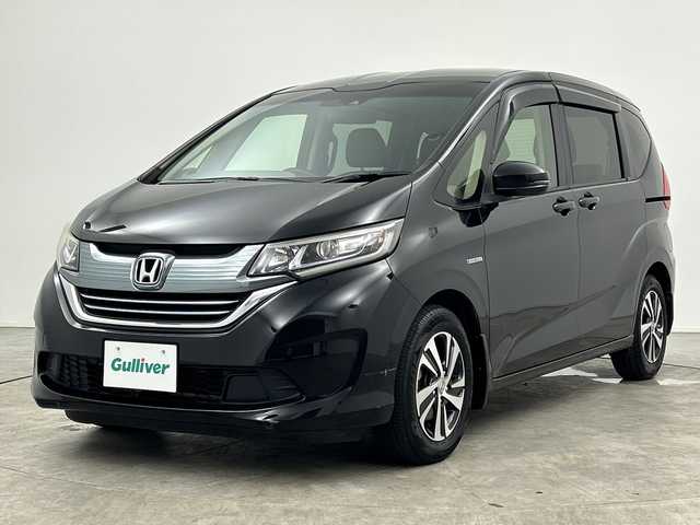 ホンダ フリード ハイブリット EX 大阪府 2016(平28)年 5.7万km クリスタルブラックパール 純正ナビ（VXM-174VFi）/・フルセグ/・CD/DVD/・Bluetooth/・SD/・iPod/バックカメラ/両側パワースライドドア/前席シートヒーター/クルーズコントロール/ステアリングスイッチ/ビルトインETC/衝突軽減システム/車線逸脱警報