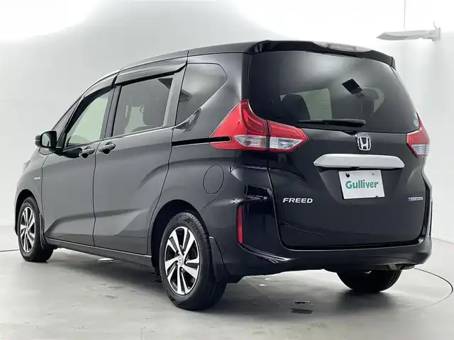 ホンダ フリード ハイブリット EX 福井県 2016(平28)年 5.7万km クリスタルブラックパール 純正ナビ　型式：VXM-174VFi/(フルセグTV/CD/DVD/Bluetooth/SD/iPod)/バックカメラ/両側パワースライドドア/前席シートヒーター/クルーズコントロール/ステアリングスイッチ/ビルトインETC/衝突軽減システム/車線逸脱警報