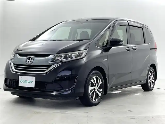 ホンダ フリード ハイブリット EX 福井県 2016(平28)年 5.7万km クリスタルブラックパール 純正ナビ　型式：VXM-174VFi/(フルセグTV/CD/DVD/Bluetooth/SD/iPod)/バックカメラ/両側パワースライドドア/前席シートヒーター/クルーズコントロール/ステアリングスイッチ/ビルトインETC/衝突軽減システム/車線逸脱警報