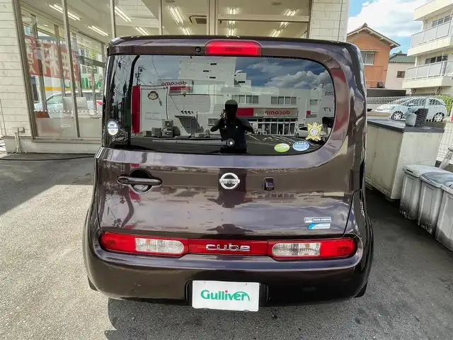 日産 キューブ 15X Vセレクション 愛知県 2010(平22)年 8.6万km ビターショコラ /当店買取/禁煙/1オーナー//純正ナビ//Bluetooth/地デジ/CD/DVD//スマートキー//革巻きステアリング//ベンチシート//純正フロアマット/ドアバイザー//電動格納ミラー//保証書