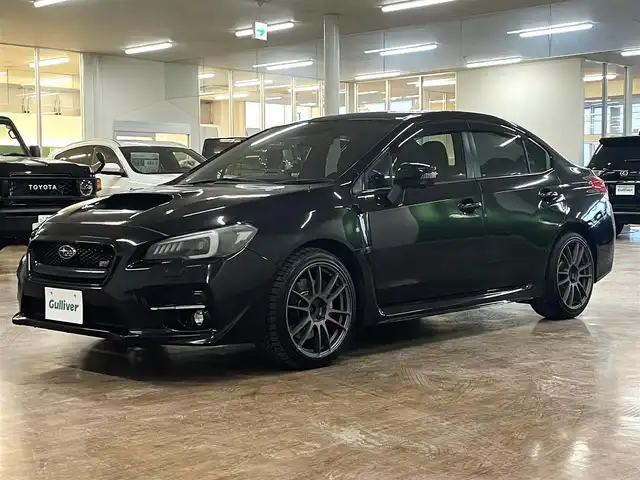 スバル ＷＲＸ ＳＴＩ STI 道央・札幌 2016(平28)年 8.5万km クリスタルブラックシリカ 6MT/ハーフレザーシート/RAYS18インチAW/HKSメタルメタルキャタライザー（触媒）/純正SDナビ/フルセグTV/SD/DVD/Bluetooth/MS/SD/バックカメラ/サイドカメラ/ブラインドスポットモニター/社外LEDヘッドライト/社外ドアミラーウインカー/純正トランクスポイラー/プッシュスタート/ステアリングリモコン/横滑り防止/ヘッドライトレベライザー/パワーシート（D席）/ETC/純正フロアマット/ドアバイザー/保証書/取扱説明書/ナビ説明書