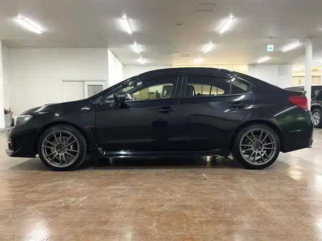 スバル ＷＲＸ ＳＴＩ STI 道央・札幌 2016(平28)年 8.5万km クリスタルブラックシリカ 6MT/ハーフレザーシート/RAYS18インチAW/HKSメタルメタルキャタライザー（触媒）/純正SDナビ/フルセグTV/SD/DVD/Bluetooth/MS/SD/バックカメラ/サイドカメラ/ブラインドスポットモニター/社外LEDヘッドライト/社外ドアミラーウインカー/純正トランクスポイラー/プッシュスタート/ステアリングリモコン/横滑り防止/ヘッドライトレベライザー/パワーシート（D席）/ETC/純正フロアマット/ドアバイザー/保証書/取扱説明書/ナビ説明書