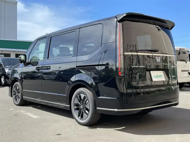 ホンダ ステップワゴン スパーダ eHEV 東京都 2025(令7)年 0.1千km クリスタルブラックパール 登録済み未使用車/純正ナビ　/・フルセグ　Bluetooth　CD　DVD/両側電動スライド　/電動リアゲート　/レーダークルーズコントロール　/ＢＳＩ　/テールゲートスポイラー　/シートヒーター　/純正アルミホイール　/純正ＬＥＤ　/オットマン　/パドルシフト　/ＡＢＳ　/横滑り防止/盗難防止装置/コーナーセンサー/レーンアシスト/衝突被害軽減ブレーキ