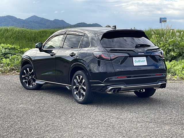 ホンダ ＺＲ－Ｖ ハイブリッド e:HEV Z 新潟県 2023(令5)年 2.3万km クリスタルブラックパール 4WD/純正メモリナビ/BT/USB/フルセグテレビ/全方位カメラ/ETC2.0/ドライブレコーダー/衝突被害軽減ブレーキ/レーンキープアシスト/レーダークルーズコントロール/革シート/パワーシート/シートヒーター /ステアリングヒーター/ステアリングスイッチ/パドルシフト/パワーバックドア/コーナーセンサー/スマートキー/プッシュスタート/LEDヘッドライト/オートライト/オートハイビーム/フォグランプ/純正18インチアルミホイール