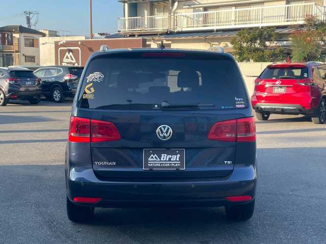 フォルクスワーゲン ゴルフ トゥーラン TSI ハイライン 宮崎県 2014(平26)年 10.5万km 紺Ｍ 純正ナビ/フルセグTV/バックカメラ/ルーフレール/コーナーセンサー/キセノンライト/スペアキー/取扱説明書