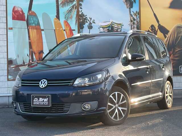 フォルクスワーゲン ゴルフ トゥーラン TSI ハイライン 宮崎県 2014(平26)年 10.5万km 紺Ｍ 純正ナビ/フルセグTV/バックカメラ/ルーフレール/コーナーセンサー/キセノンライト/スペアキー/取扱説明書