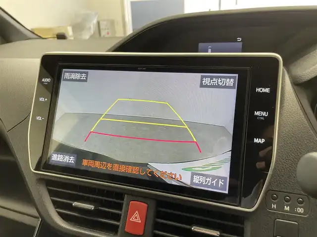 トヨタ ノア Si ダブルバイビーⅡ 滋賀県 2019(令1)年 6.4万km ブラック 禁煙車/純正10型ナビ/CD.DVD.Bluetooth.フルセグ/バックカメラ/12.1型フリップダウンモニター/トヨタセーフティセンス/・プリクラッシュセーフティ/・レーンディパーチャーアラート/・オートマチックハイビーム/クルーズコントロール/LEDヘッドライト/オートライト/ハーフレザーシート/両側パワースライドドア/ビルトインETC2.0/純正前方ドライブレコーダー/テレビキャンセラー/アイドリングストップ/クリアランスソナー