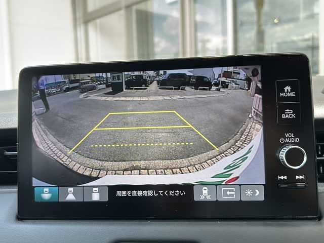ホンダ ヴェゼル ハイブリッド e:HEV Z 静岡県 2025(令7)年 0.1万km未満 クリスタルブラックパール 【主要装備】/Ｈｏｎｄａ　ＣＯＮＮＥＣＴディスプレー/ＥＴＣ２．０車載器/ワイヤレス充電器　/メモリナビ/バックカメラ　/パワーバックドア　/プッシュスタート　/スマートキー　/純正１８インチアルミホイール　/レーダークルーズコントロール/前席シートヒーター/ハーフレザーシート/アップルカープレイ/アンドロイドオート/レーダークルーズコントロール/プリクラッシュセーフティ/クリアランスソナー