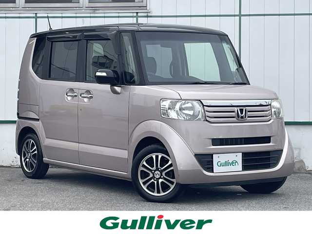 ホンダ Ｎ ＢＯＸ 2トーン G ターボ Lパッケージ 山梨県 2014(平26)年 9万km チェリーシェルピンクメタリック 社外メモリナビ(NR-MZ40)/CD/DVD/フルセグTV/ETC/両側電動スライドドア/クルーズコントロール/パドルシフト/サイドバイザー/スマートキー/スペアキー1本/保証書