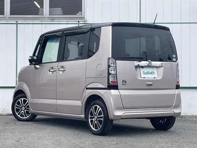 ホンダ Ｎ ＢＯＸ 2トーン G ターボ Lパッケージ 山梨県 2014(平26)年 9万km チェリーシェルピンクメタリック 社外メモリナビ(NR-MZ40)/CD/DVD/フルセグTV/ETC/両側電動スライドドア/クルーズコントロール/パドルシフト/サイドバイザー/スマートキー/スペアキー1本/保証書