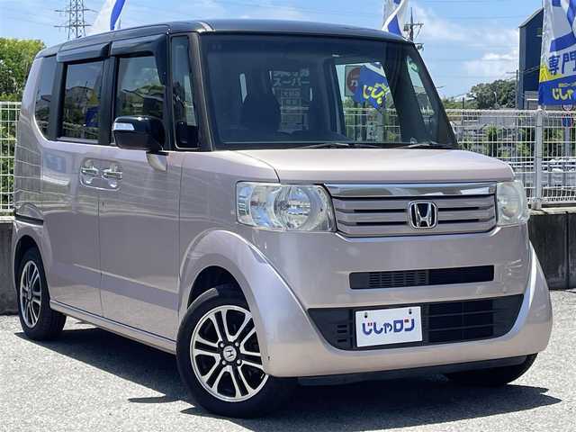 ホンダ Ｎ ＢＯＸ 2トーン G ターボ Lパッケージ 兵庫県 2014(平26)年 9万km チェリーシェルピンクメタリック (株)IDOMが運営する【じしゃロン神戸名谷店】の自社ローン専用車両になりますこちらは現金またはオートローンご利用時の価格です。自社ローンご希望の方は別途その旨お申付け下さい/社外メモリナビ(NR-MZ40)/CD/DVD/フルセグTV/ETC/両側電動スライドドア/クルーズコントロール/アイドリングストップシステム/革巻きステアリングホイール/パドルシフト/ステアリングスイッチ/サイドバイザー/ターボ/スマートキー/スペアキー1本/保証書