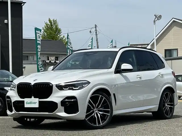 ＢＭＷ ＢＭＷ Ｘ５ xDrive 40d Mスポーツ 宮城県 2023(令5)年 1.1万km ミネラルホワイト ワンオーナー/純正メーカーナビ（FM:AM:TV:BT：USBポート）//バーチャルコックピット//ドラレコ前後//スマートキー//サンルーフ//オートクルーズコントロール//ＨＤＣ//360°ビュー//3Dビュー//ETC//純正オーディオｈａｒｍａｎ　ｋａｒｄｏｎ//純正メモリナビ（ＦＭ，ＡＭ，ＢＴ）//フルセグテレビ//アダプティブエアサス//アイドリングストップ//プッシュスタート//全席ヒートシート　パワーシート//D/Nエアーシート//インテリジェントセーフティ//温度調整機能付きドリンクホルダー//USBポート//横滑り防止機能//D/Nマッサージシート//パーキングアシスト//スマホ充電トレイ