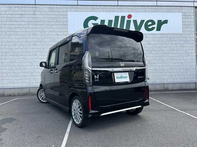 ホンダ Ｎ ＢＯＸ カスタム L ターボ 静岡県 2023(令5)年 2.1万km クリスタルブラックパール 純正ギャザーズナビ/（AM/FM/CD/DVD/BT)/フルセグTV/バックカメラ/アイドリングストップ/両側パワースライドドア/前方ドライブレコーダー/ビルトインETC/レーダークルーズコントロール/コーナーセンサー/LEDヘッドライト/ハーフレザーシート/オートライト/オートマチックハイビーム/スマートキー/プッシュスタート/ターボ車/衝突被害軽減ブレーキ/レーンキープアシスト/横滑り防止装置/電動パーキングブレーキ/パドルシフト/取り扱い説明書/保証書